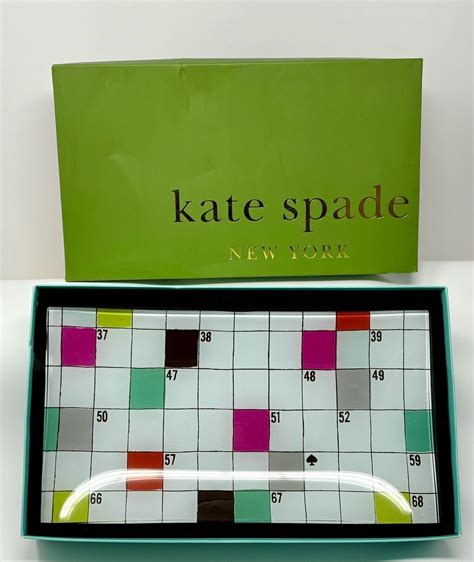 Designer item from Hermès or Kate Spade NYT Crossword